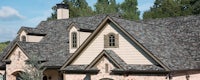 an image of a house with a shingled roof